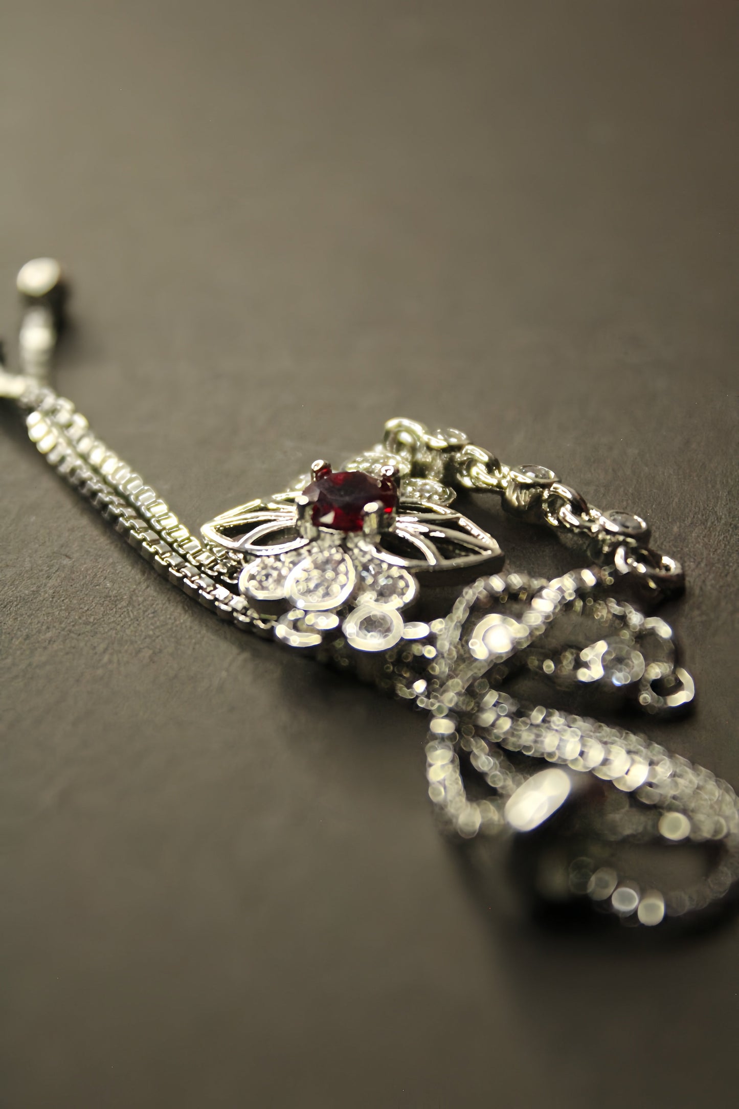 Floral Silver Bracelet With Red Zircon