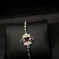 Floral Silver Bracelet With Red Zircon