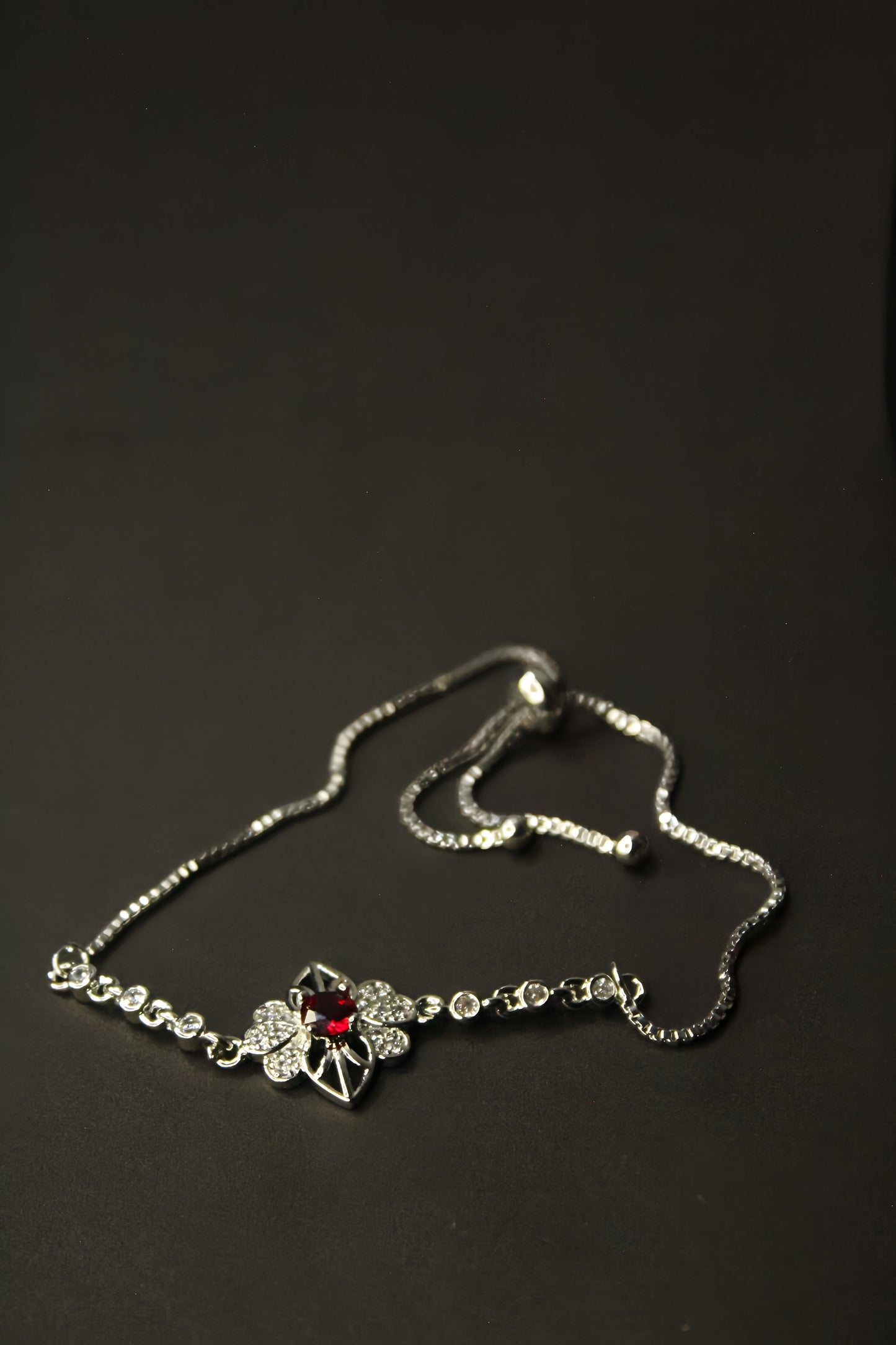 Floral Silver Bracelet With Red Zircon