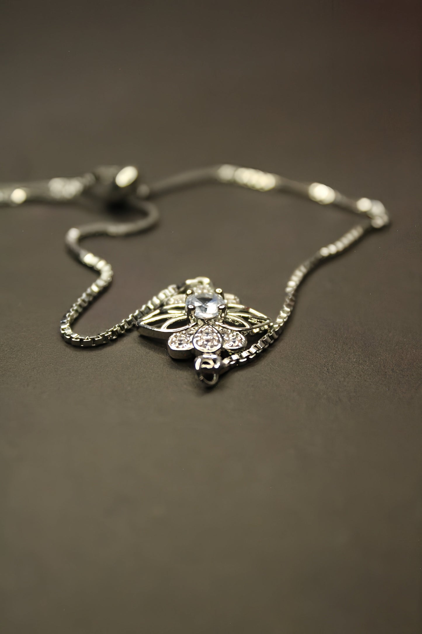 Floral Design Bracelet  With Transparent Zircon